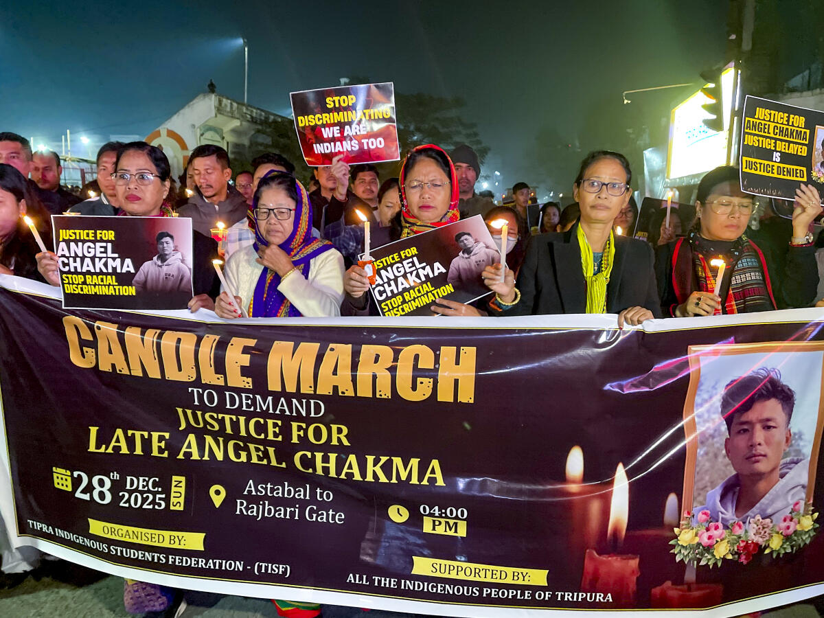 People take part in a candlelight march organised by the Tipra Indigenous Students Federation (TISF) against the death of Angel Chakma, in Agartala, Tripura.