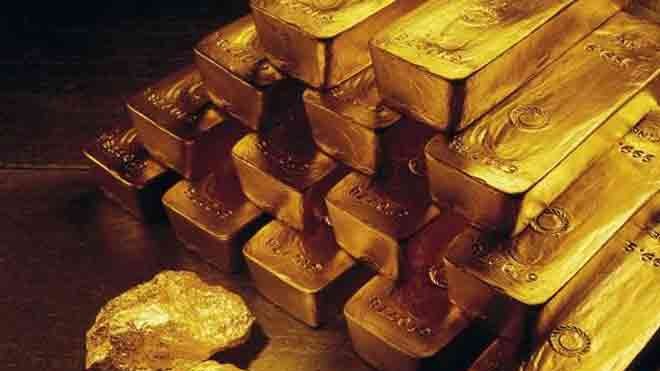 Gold, silver futures plunge as traders book profits on weak global cues, strong dollar