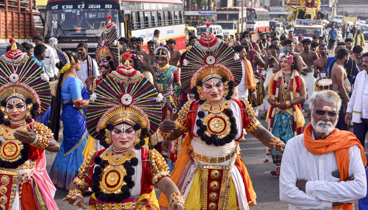 Artistes play traditional instruments during a Lord Ayyappa procession, in Chikkamagaluru, Karnataka, Wednesday, Dec. 31, 2025.