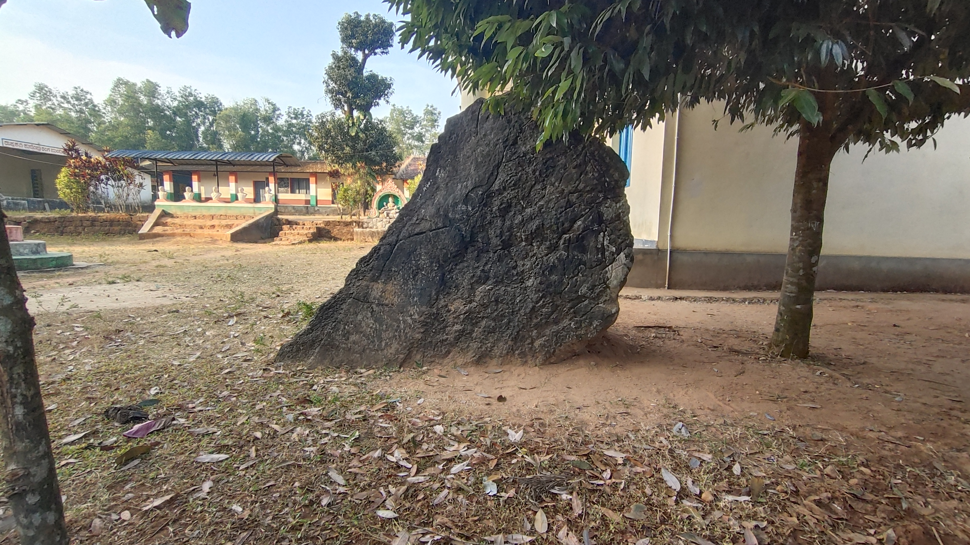 The Karimane Government School which occupies the northern part of the Nilaskal stone alignment with one of the menhirs within its premises. Photo by Srikumar M Menon