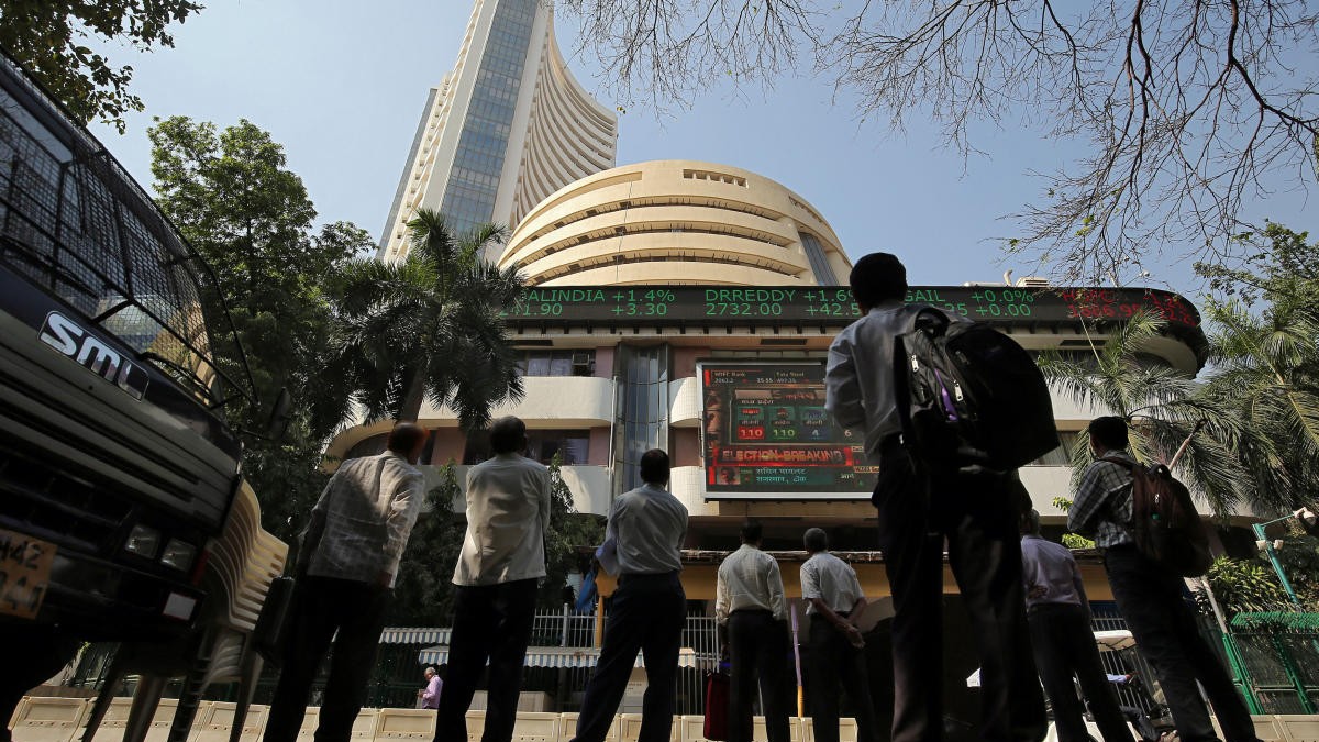Stock markets trade lower after initial rally on foreign fund outflows, selling in blue-chips