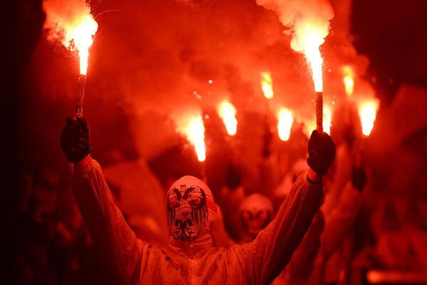 FC Cologne fans hold flares before the match.