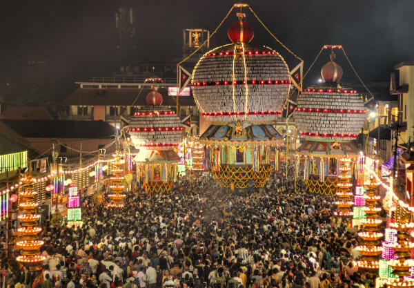 People participate in the Three Chariot Festival, in Udupi district, Karnataka.