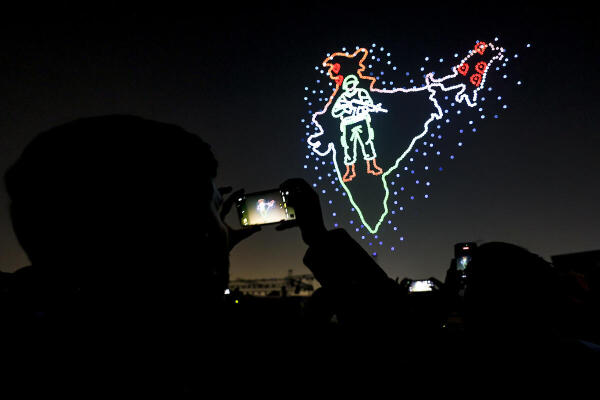 People witness a drone show during 'Shaurya Sandhya' as part of the 78th Army Day celebrations, at Sawai Mansingh Stadium, in Jaipur.