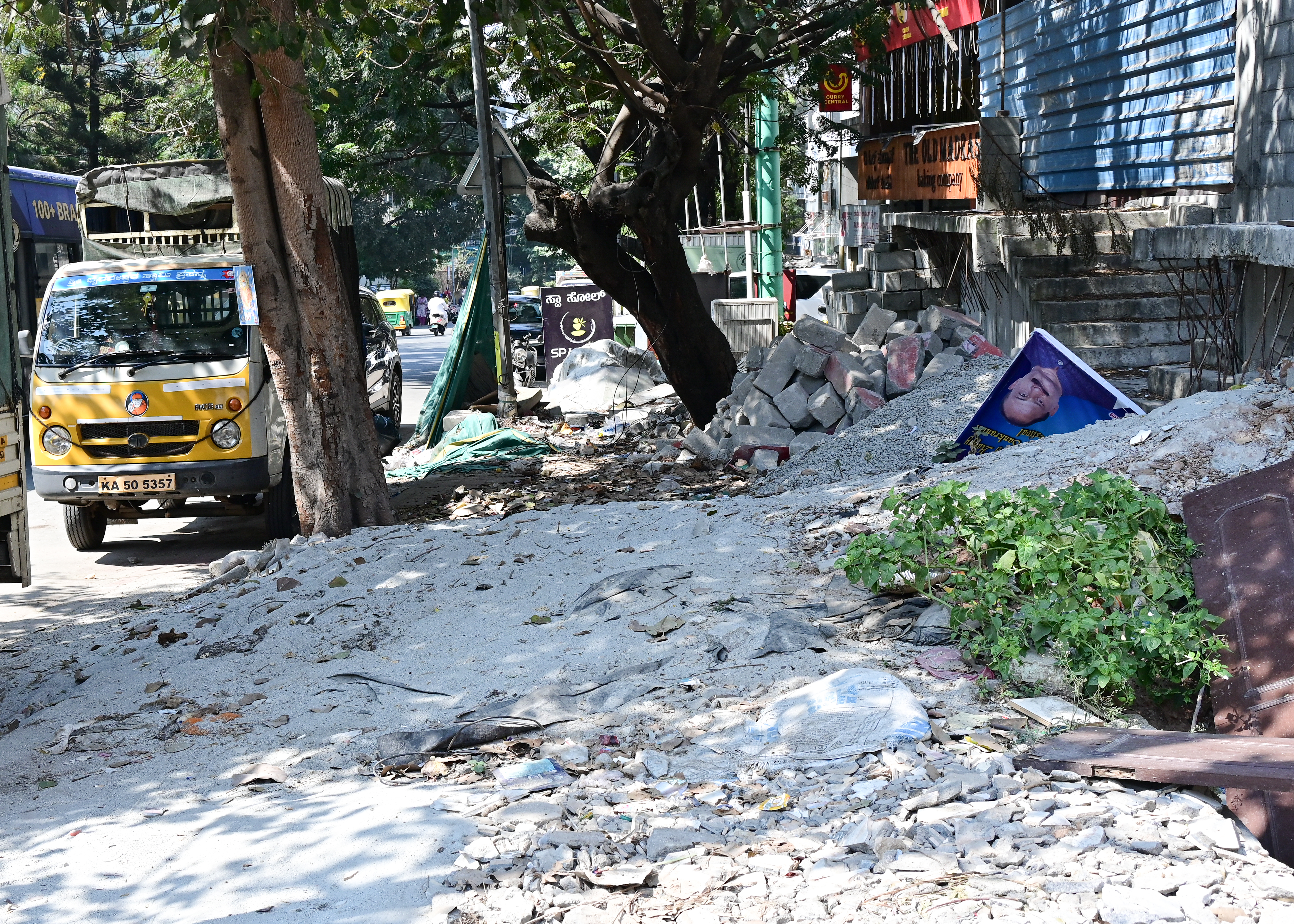 Pedestrian space taken over along the footpath on 80 Feet Road near MS Ramaiah Hospital. 
