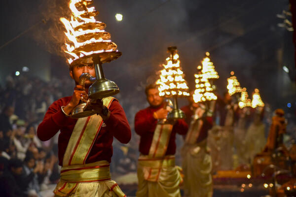Priests perform Ganga Arti at Dashashwamedh Ghat ahead of Mauni Amavasya during Magh Mela, in Prayagraj.