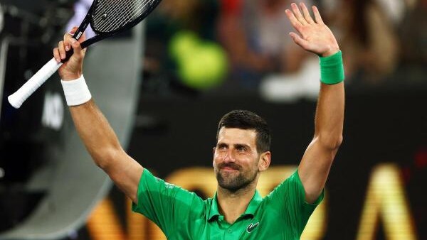 Novak Djokovic reaches 100th Australian Open match win in hunt for 25th Grand Slam