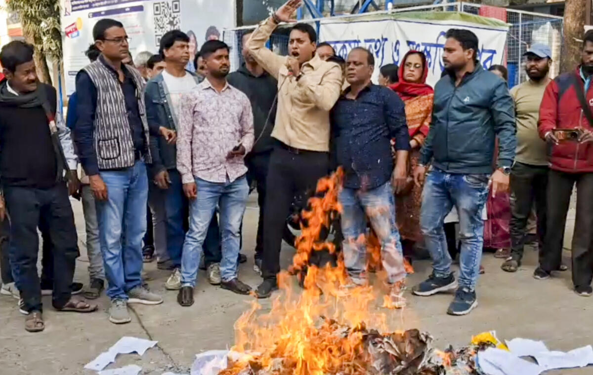 Bharatiya Janata Party (BJP) and Trinamool Congress (TMC) workers during a clash over the submission of Form 7, objecting to the inclusion of voters, as part of the Special Intensive Revision (SIR), at Lalbag subdivision in Murshidabad, West Bengal. PTI
