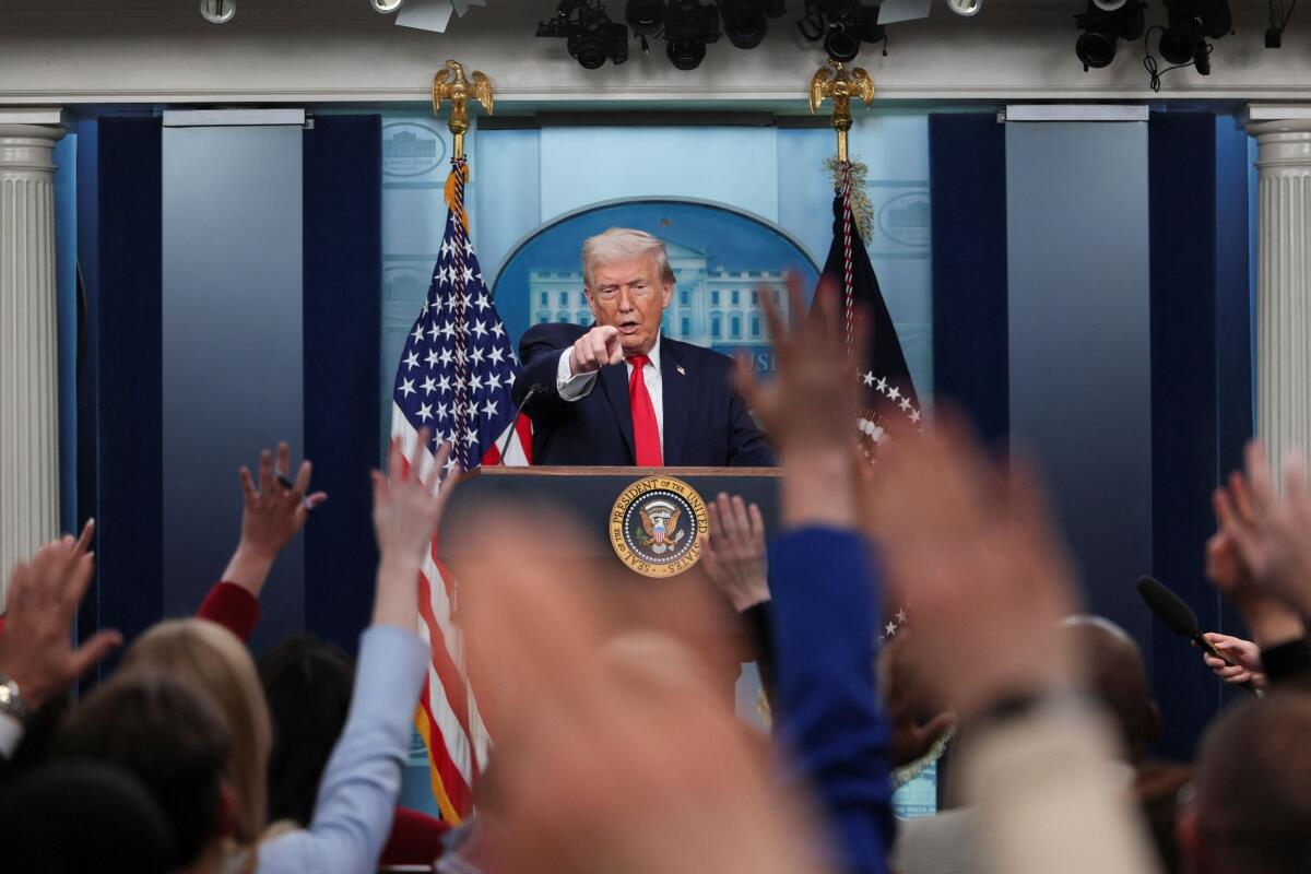 U.S. President Donald Trump takes questions from reporters during a press briefing at the White House, on the one-year mark into his second term in office, in Washington, D.C. Credit: Reuters