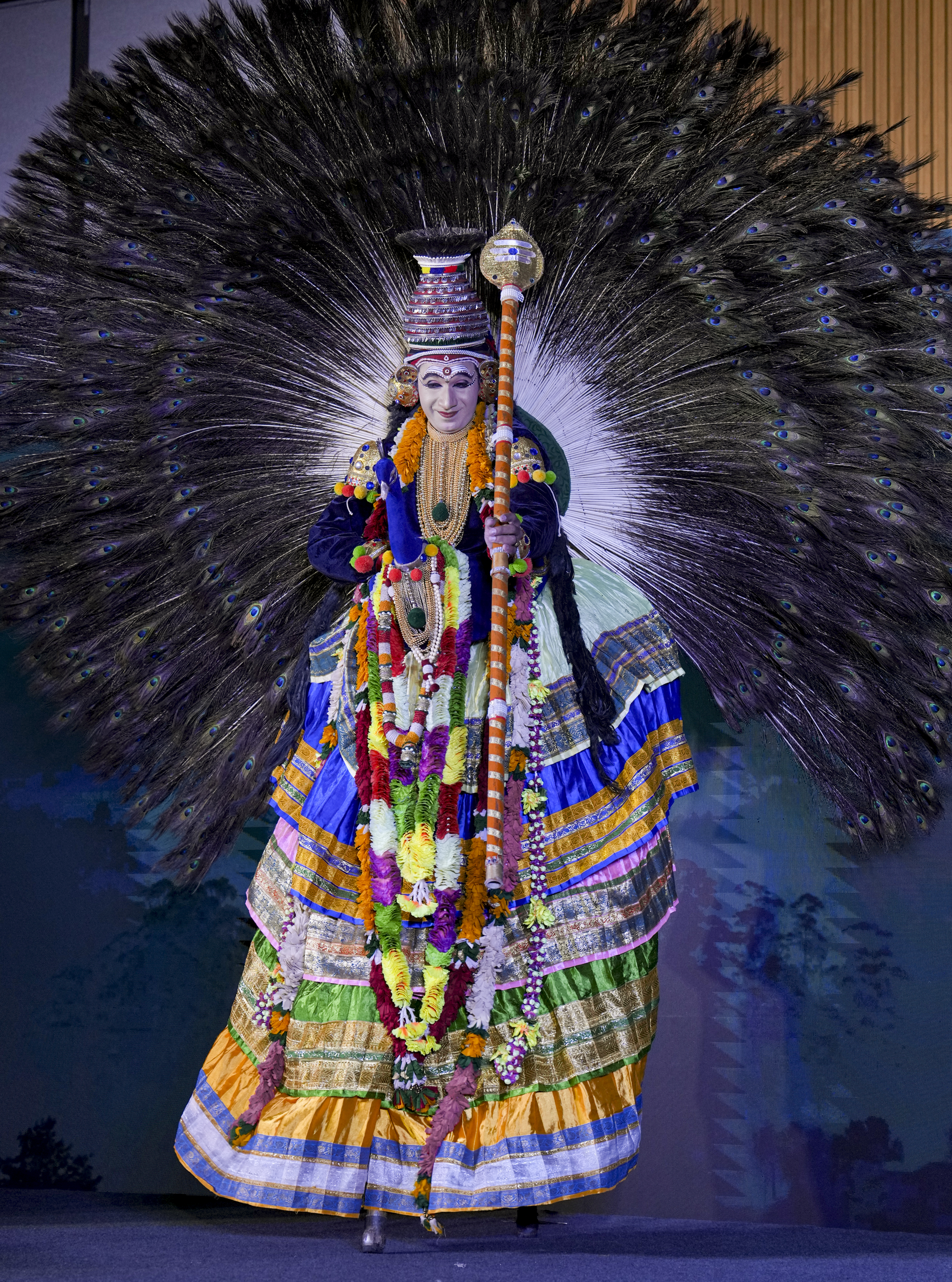 An artist performs Mayilattam, a folk dance, during an event to promote Kerala tourism, in Bengaluru, Karnataka.PTI