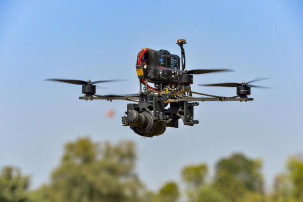 An automatic grenade-detonation drone Gati, flown by Keshavkant Sharma, founder of Protthapan Technologies, unseen, on the outskirts of Ahmedabad.