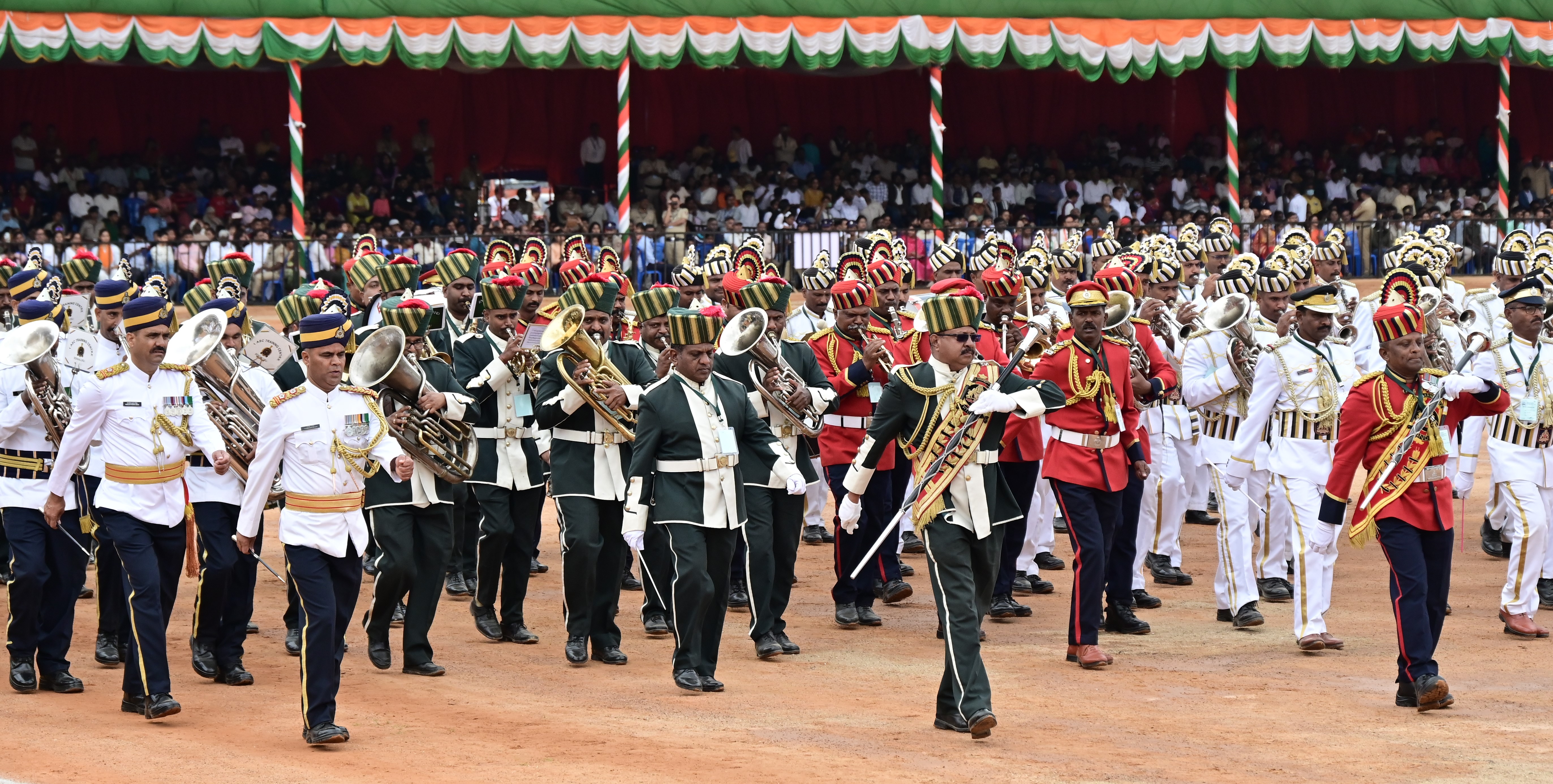 The police band marches past at the parade. 