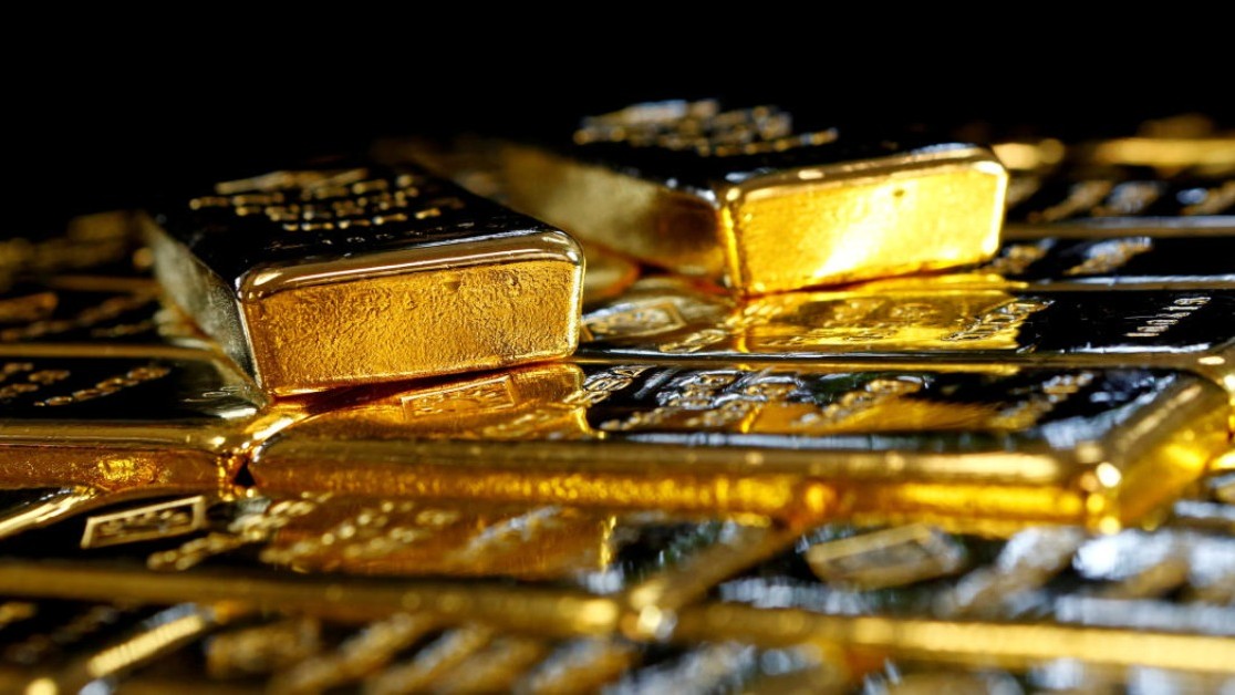 Gold climbs to record high above $5,300 as dollar slips