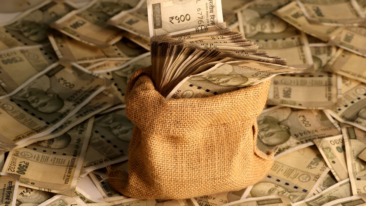 Rupee hits lowest-ever level of 92.02 against US dollar; ends with marginal gain