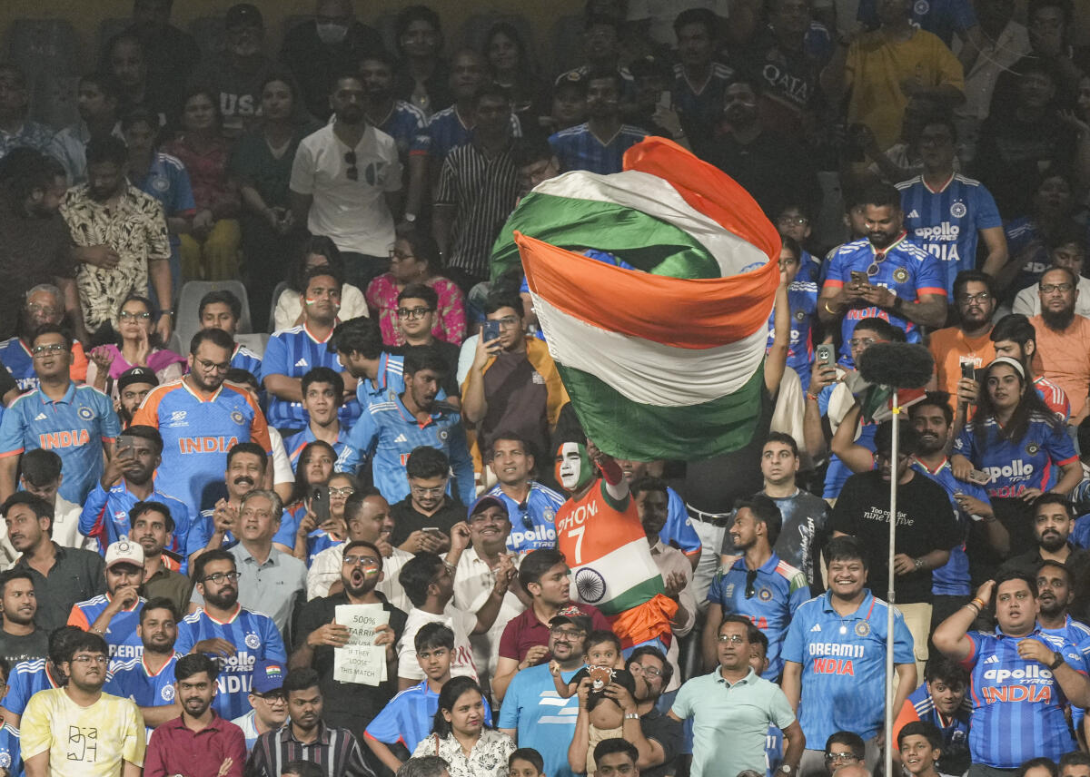 Indian fans cheer during the ICC Men's T20 World Cup 2026 cricket match between India and USA, at the Wankhede Stadium, in Mumbai, Saturday, Feb. 7, 2026.