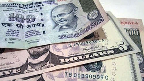 Rupee falls 14 paise to close at 90.70 against US dollar