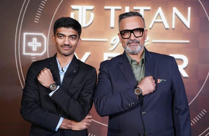 Grandmaster Gukesh Dommaraju and Rahul Shukla, Vice President and Chief Sales and Marketing Officer, Watches Division at Titan Company Limited  show new Titan's Gukesh x Grandmaster.