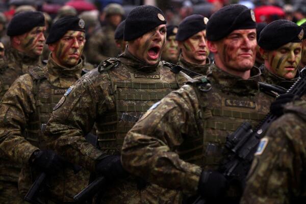 Members of the Kosovo Security Force march at a parade during celebrations of the 18th anniversary of Kosovo's independence in Pristina, Kosovo.