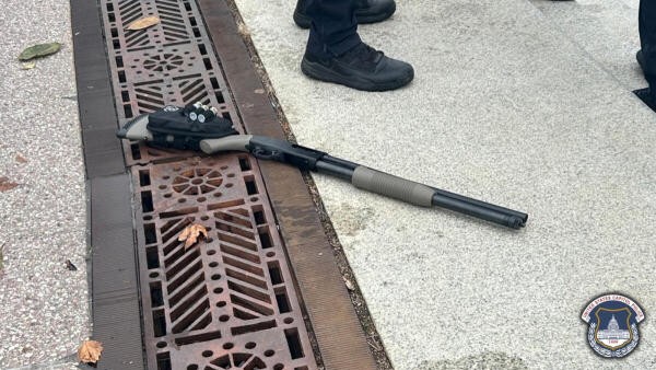 Man arrested after running toward US capitol with loaded shotgun, say police
