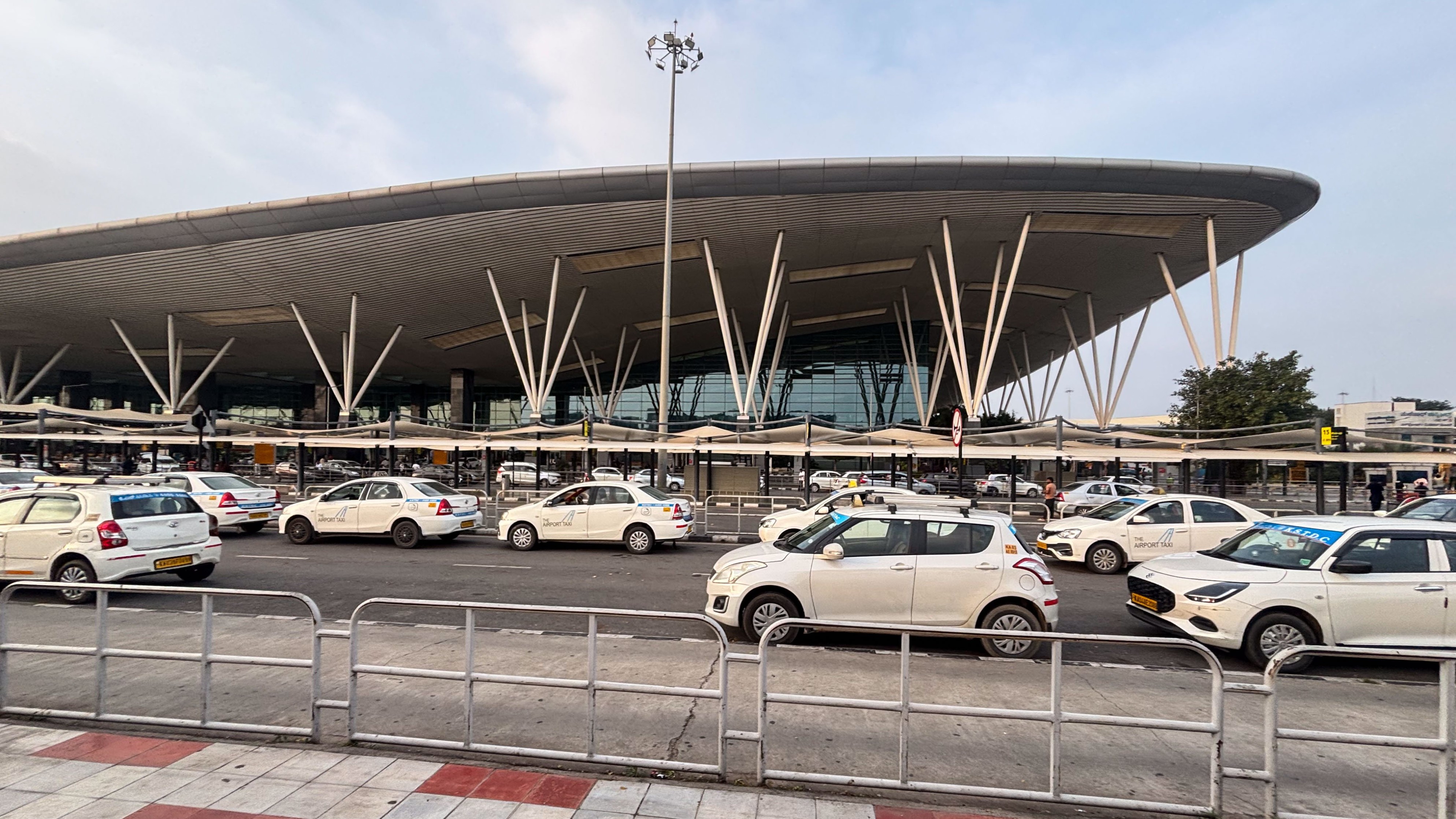 Bengaluru airport pickup rules ease, yet high fares pinch travellers