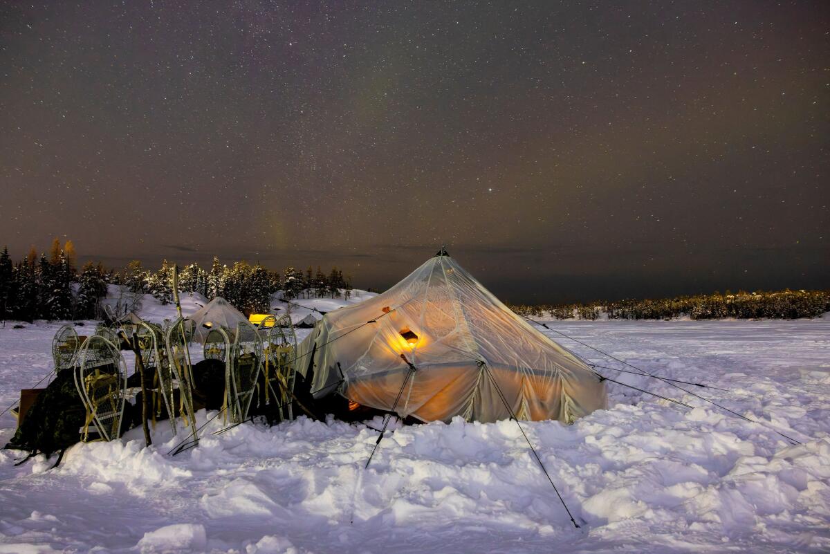 An Arctic tent of members of 41 Canadian Brigade Group, as part of Task Force Grizzly, as Canadian Armed Forces deploy to "Operation Nanook-Nunalivut," a yearly series of drills designed to highlight the military’s ability to defend the Canadian Arctic, in Yellowknife, Northwest Territories, Canada.
