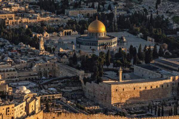 A drone view of Jerusalem and the Al-Aqsa compound, also known to Jews as the Temple Mount, during sunrise on the first Friday during the Muslim holy fasting month of Ramadan, in Jerusalem's Old City.
