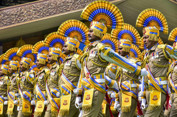 Central Reserve Police Force (CRPF) personnel march during the 87th CRPF Day Parade, in Guwahati, Assam.