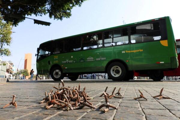 Vehicle fires and roadblocks following security operation in Mexico.