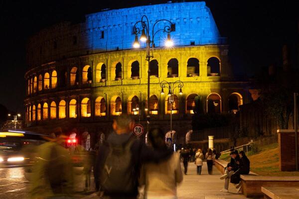 The Colosseum is illuminated in the colours of the Ukrainian flag, marking the fourth anniversary of Russia’s invasion of Ukraine, in Rome, Italy.