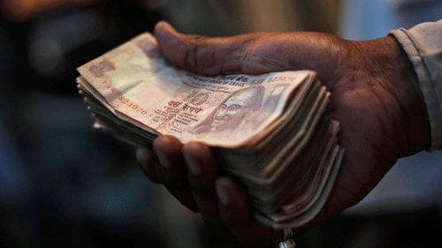 Rupee rises 6 paise to 90.89 against US dollar in early trade