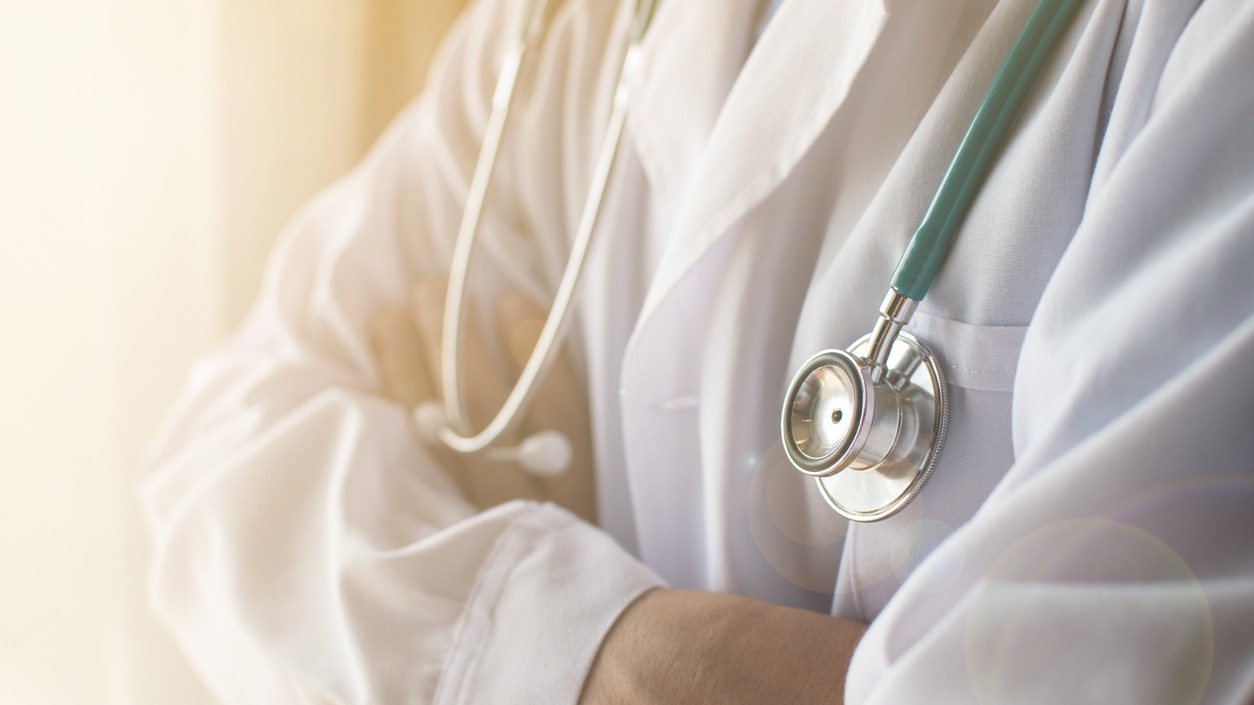 A guardian angel in a white coat