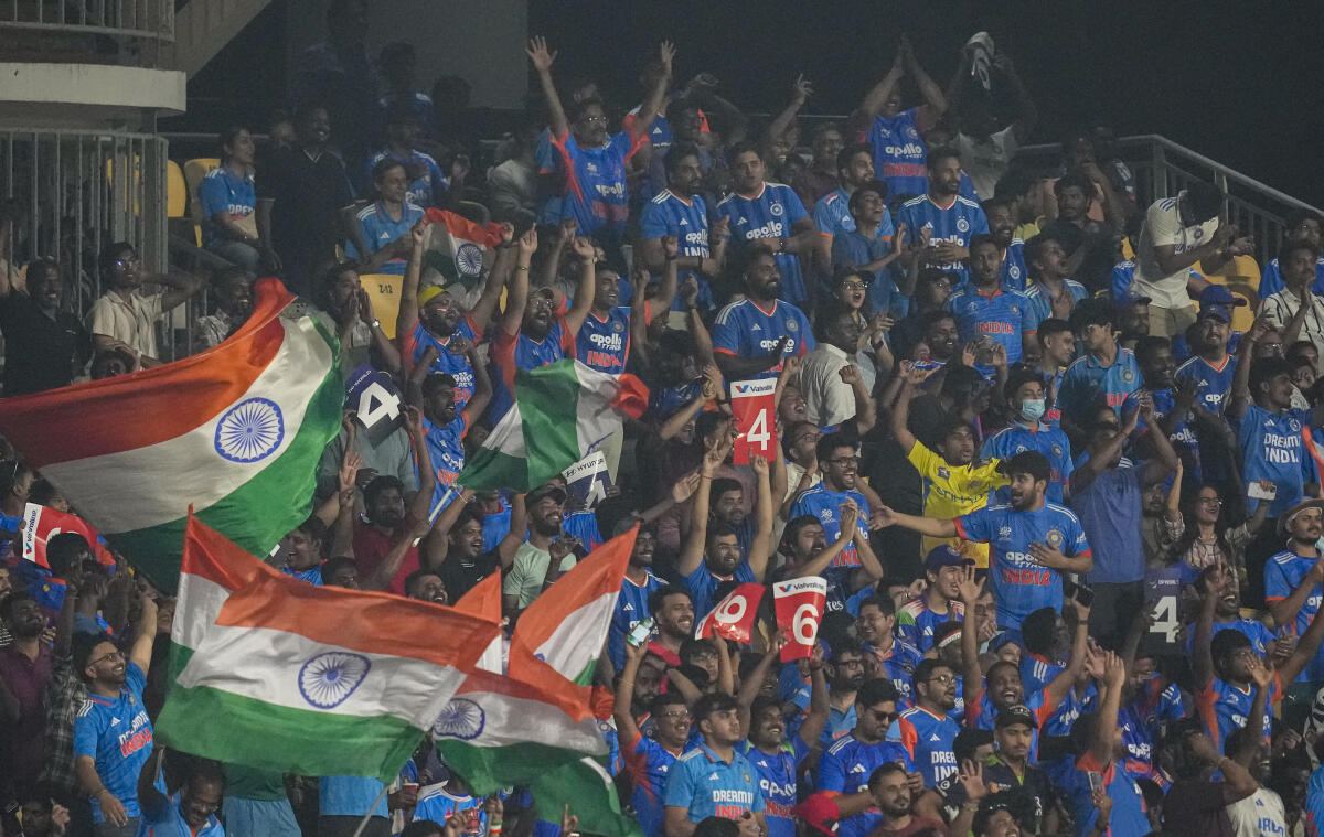 Fans cheer in the stands during an ICC Men's T20 World Cup 2026 cricket match between India and Zimbabwe.