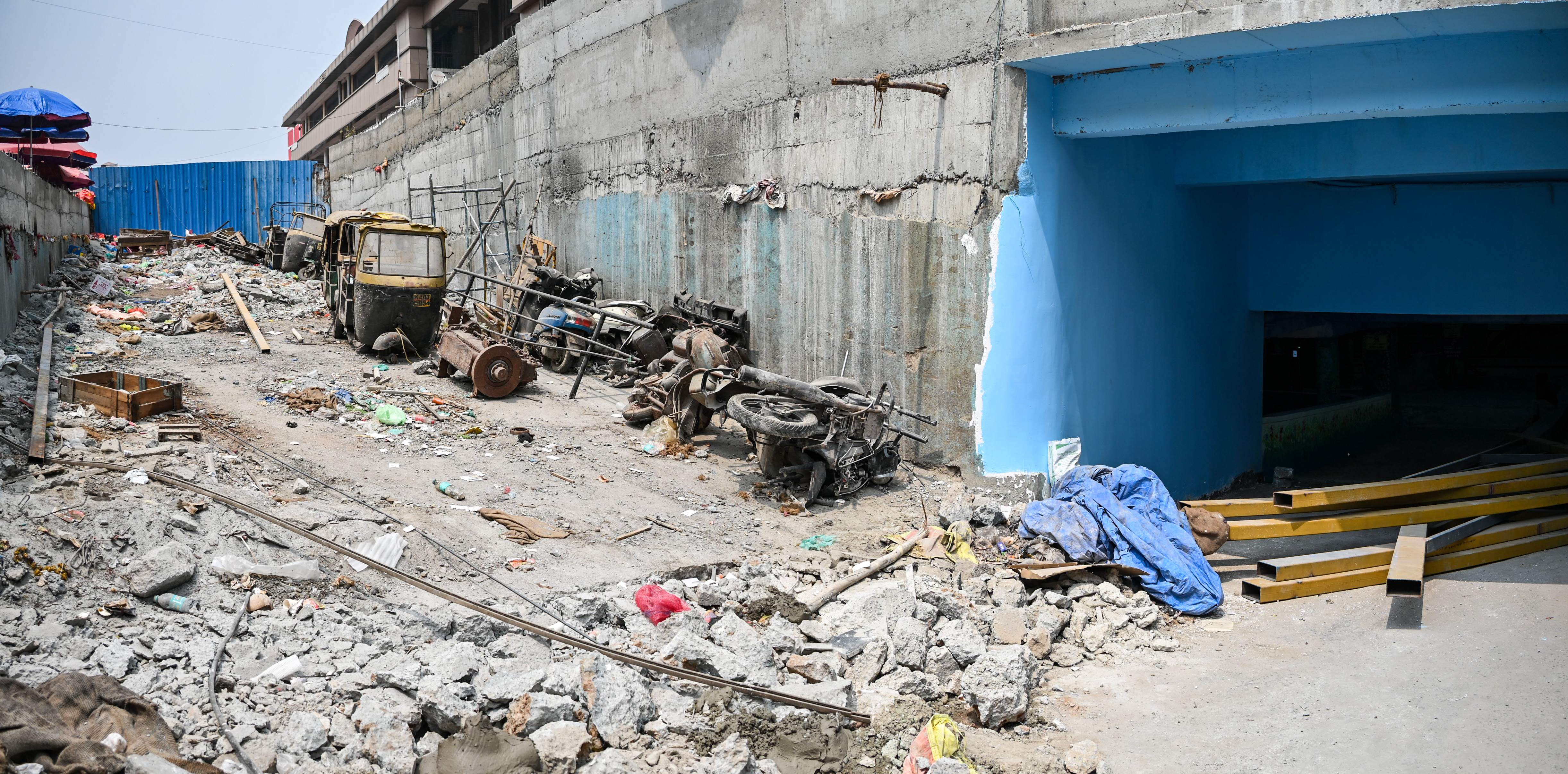 The debris including abandoned vehicles and construction materials being cleared at the KR Market underground parking on Thursday February 26 2026. DH PHOTO/PUSHKAR V