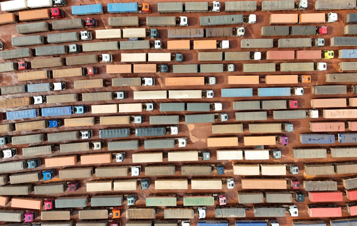 A drone view shows trucks loaded with soybeans waiting to unload at the port of Miritituba as heavy grain traffic in the region has led to long lines during Brazil's harvest shipping season, in Miritituba, Brazil
