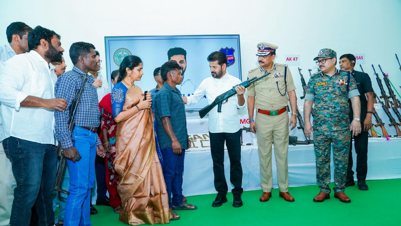 130 Maoists with huge cache of arms surrender in Telangana