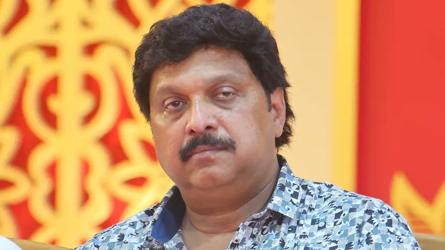 Kerala minister apologises to wife, rules out resignation; Congress continues protest