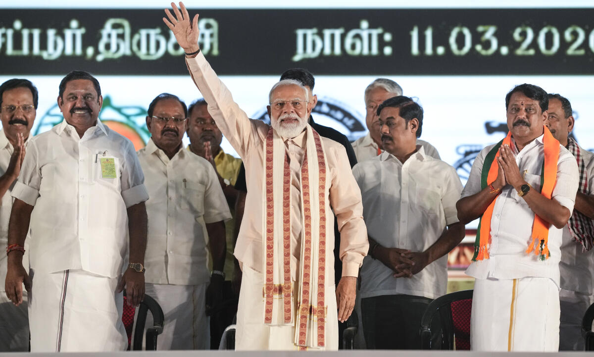 Prime Minister Narendra Modi along with AIADMK General Secretary Edappadi K Palaniswami and others during an NDA election campaign meeting for the state Assembly polls, in Tiruchirappalli.