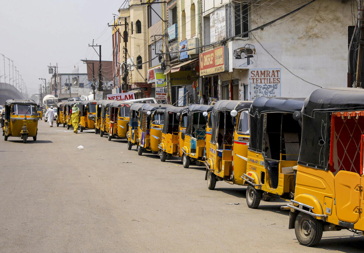 Auto-rickshaws queue up at a petrol station as consumers brace for fuel shortages in the wake of the ongoing West Asia conflict, in Hyderabad, Friday, March 13, 2026.