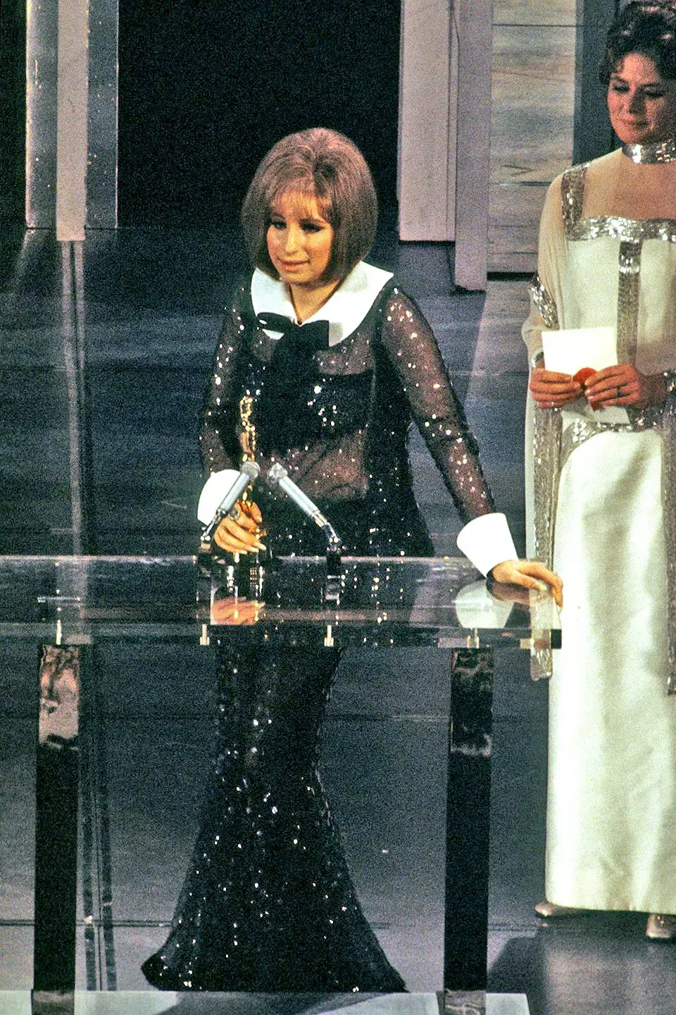 Barbra wore a sparkly black pantsuit