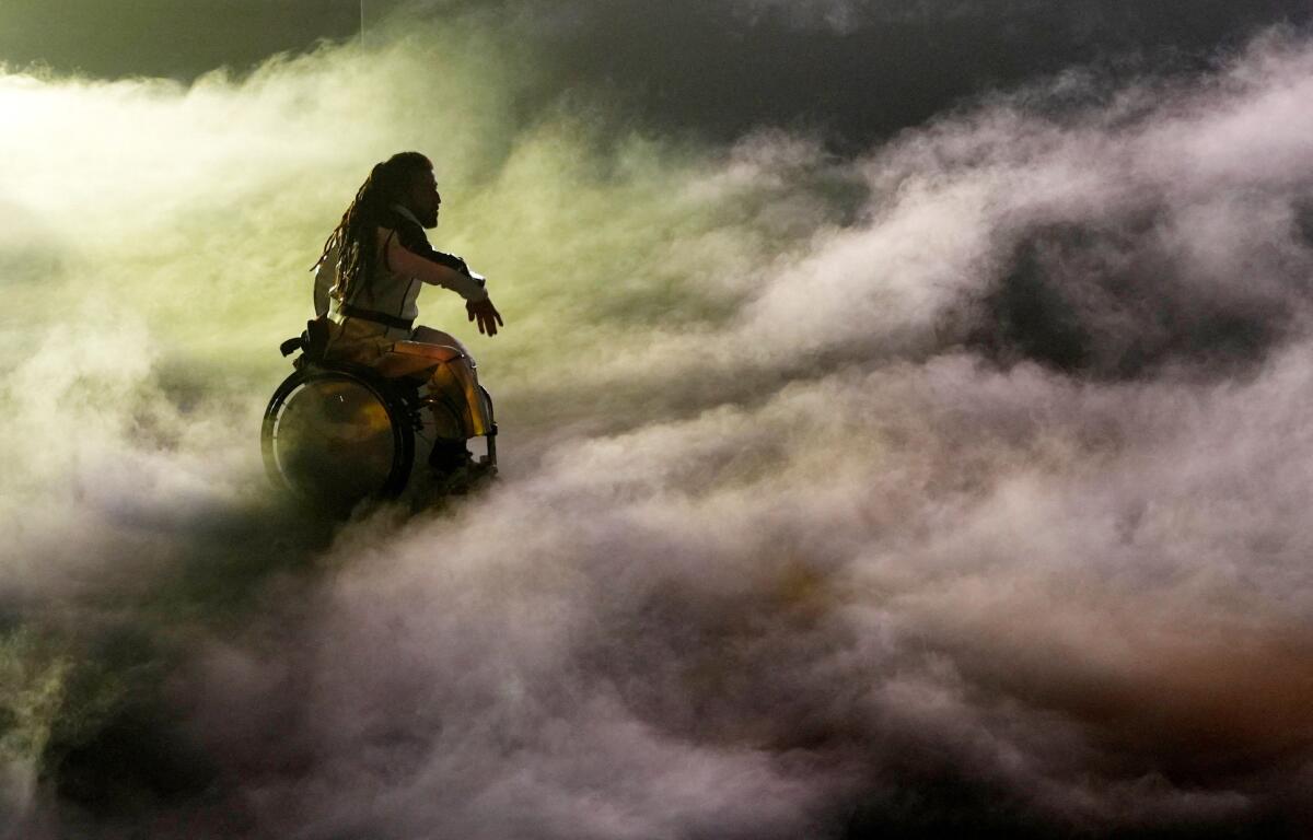 Dancer Dergin Tokmak performs during the closing ceremony