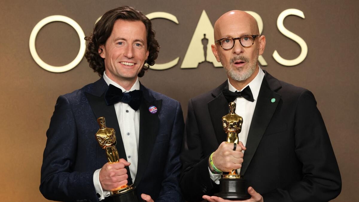 Conall Jones and Joshua Seftel pose with the Oscar for Best Documentary Short Film for All the Empty Rooms.