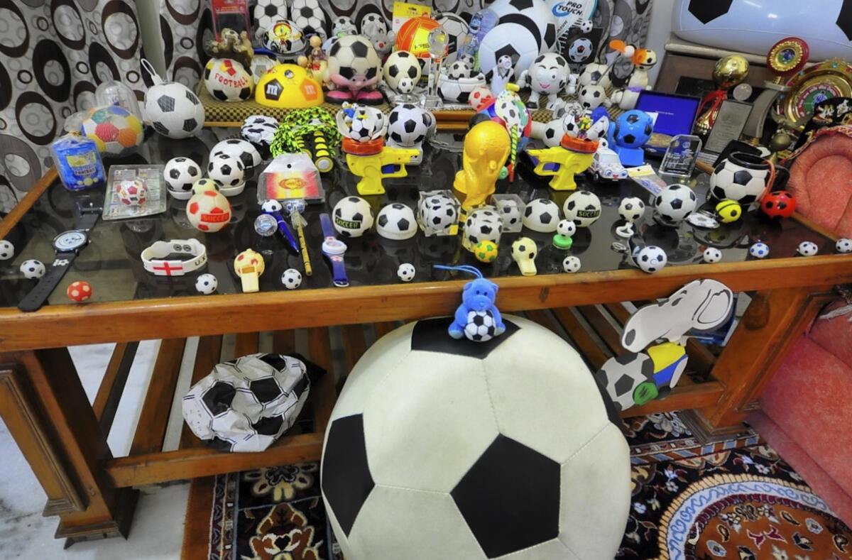A display of football-themed memorabilia from the collection of former Rajasthan football team player Lalchand Agarwal at his residence, in Jaipur, Sunday, March 15, 2026. 
