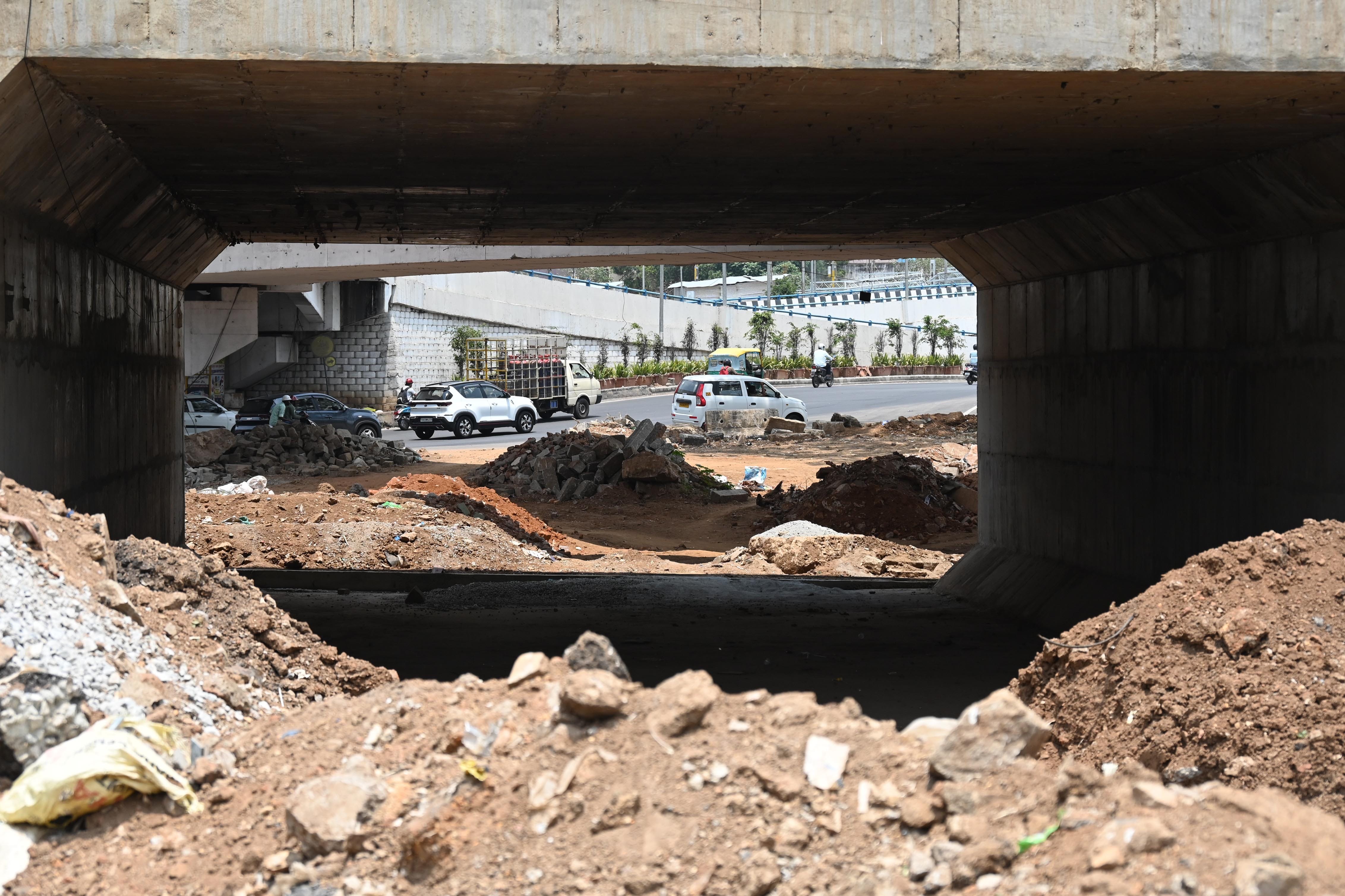 Construction debris piled up in front of the Okalipuram railway underbridge. 