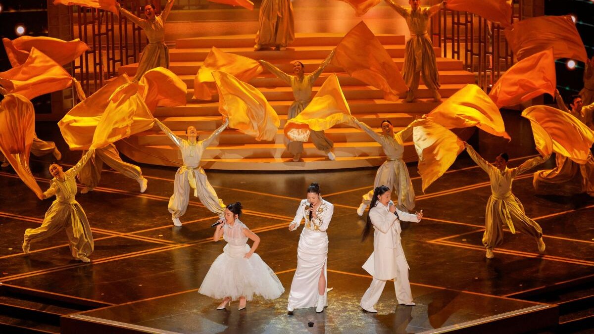 Rei Ami, EJAE, and Audrey Nuna from KPop Demon Hunters perform on stage during the Oscars.