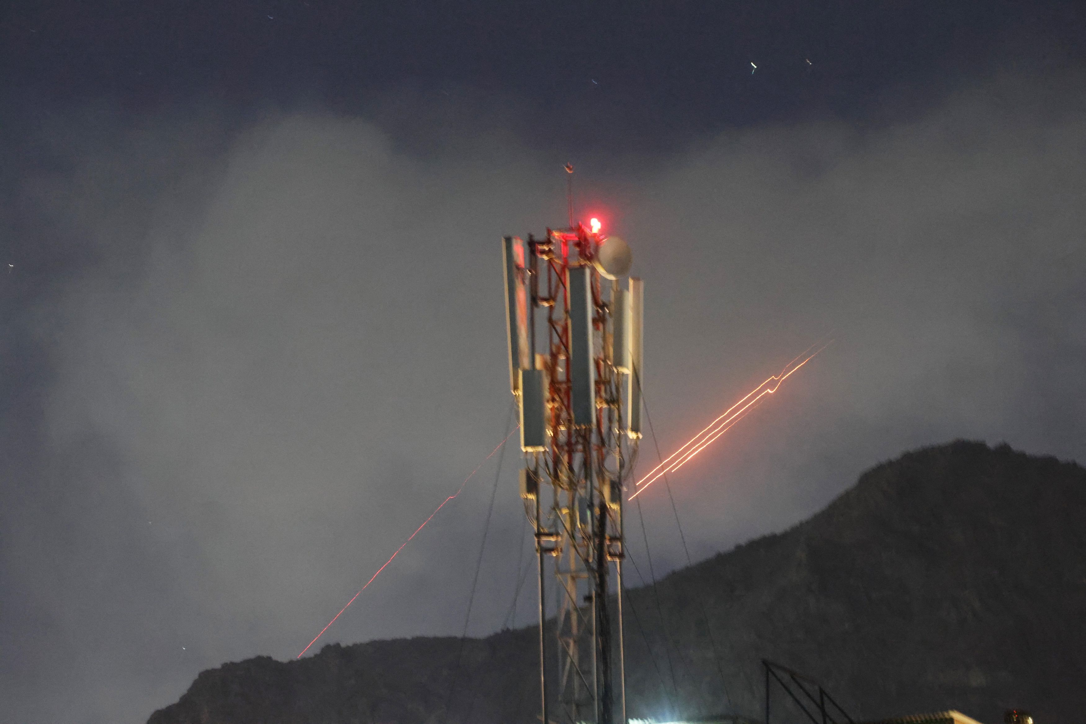 Tracers from anti-aircraft fire after an explosion in what the Taliban said was a Pakistani air strike in Kabul