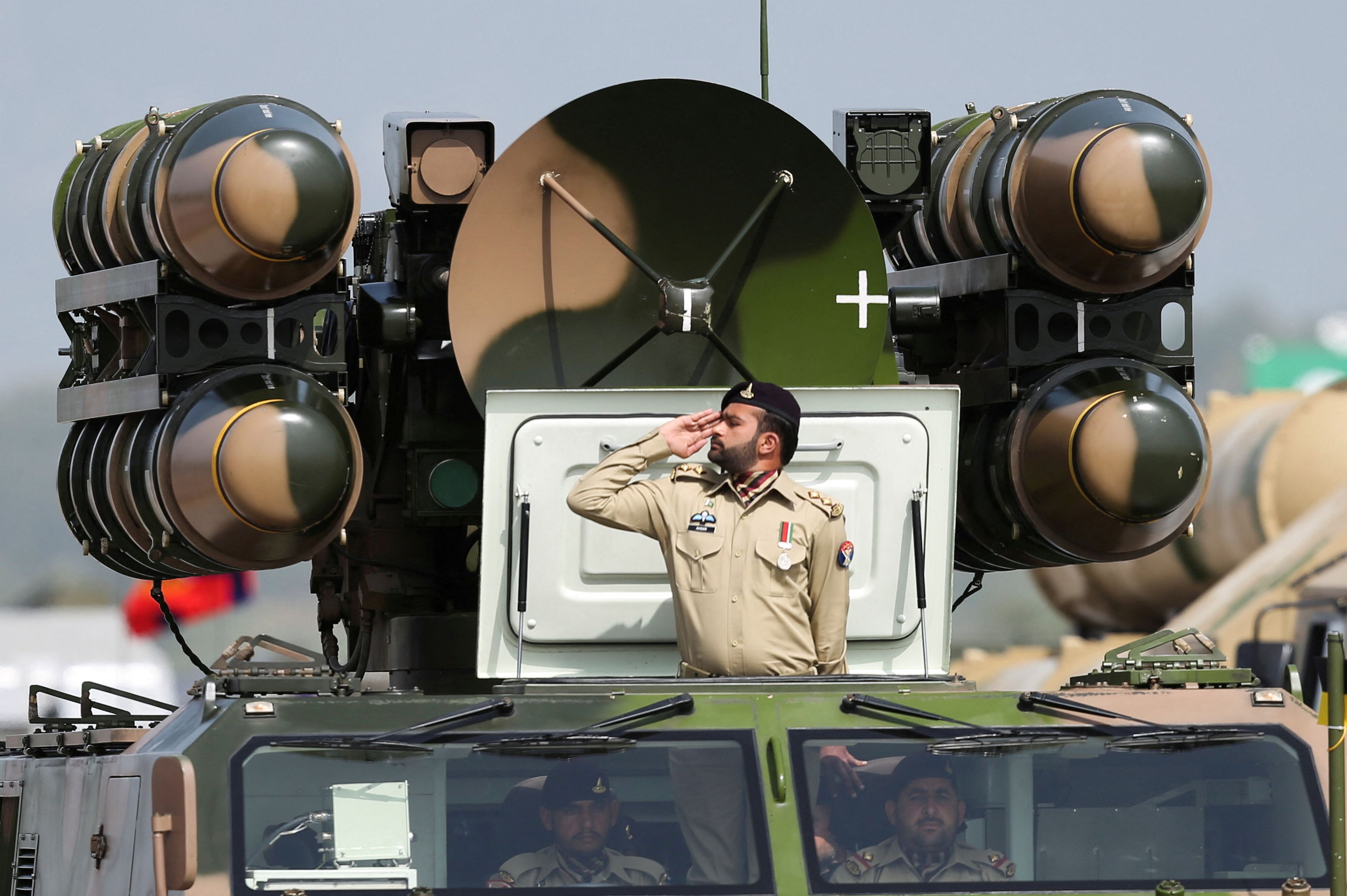 File photo: Pakistani Army soldier salutes while standing on an air defence missile system during Pakistan Day military parade in Islamabad, Pakistan, March 23, 2022.