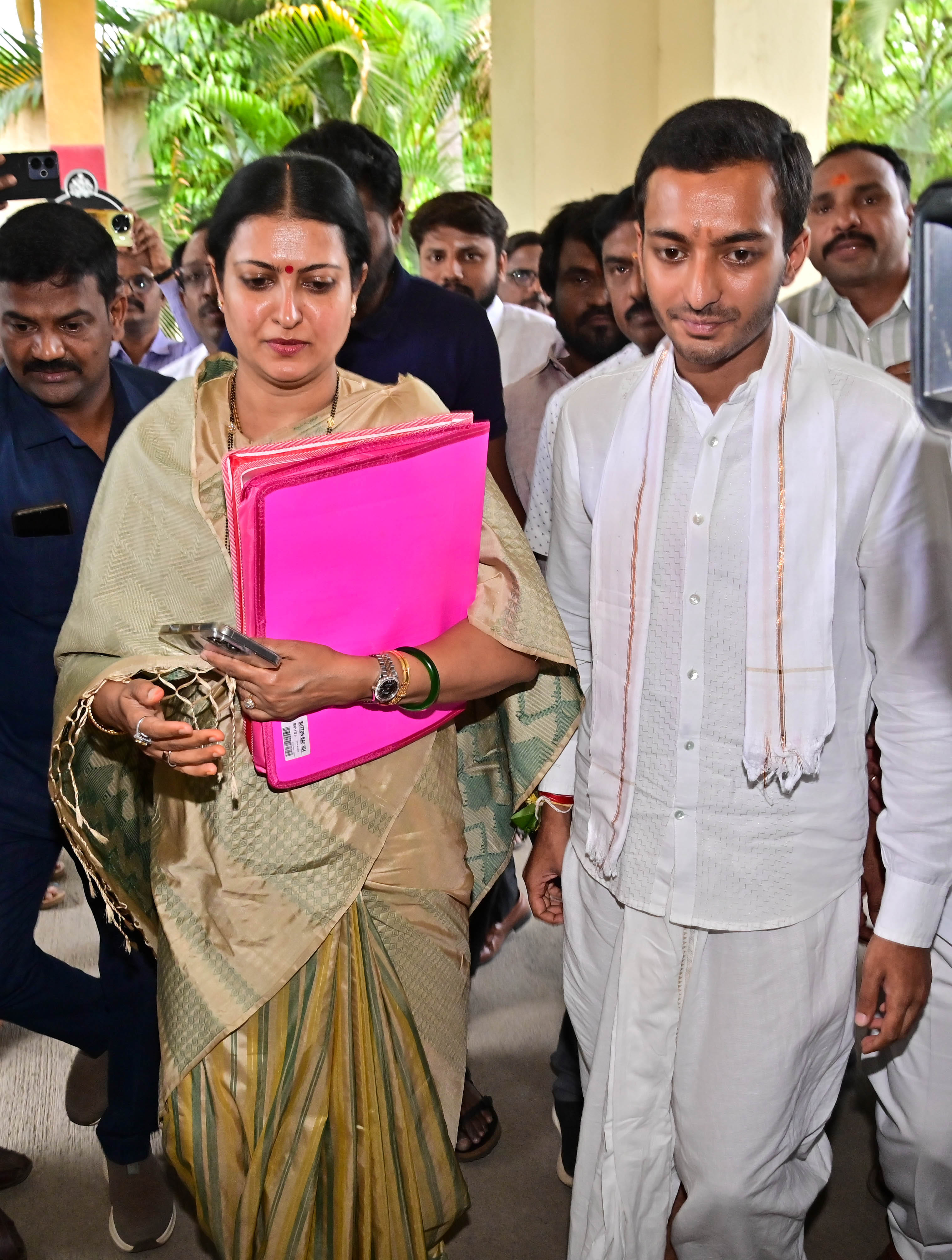 Samarth Shamanur son of minister S S Mallikarjun and MP Prabha Mallikarjun arrives with his mother and supporters for the filing of nomination for the bypoll to Davangere South constituency on Friday.
