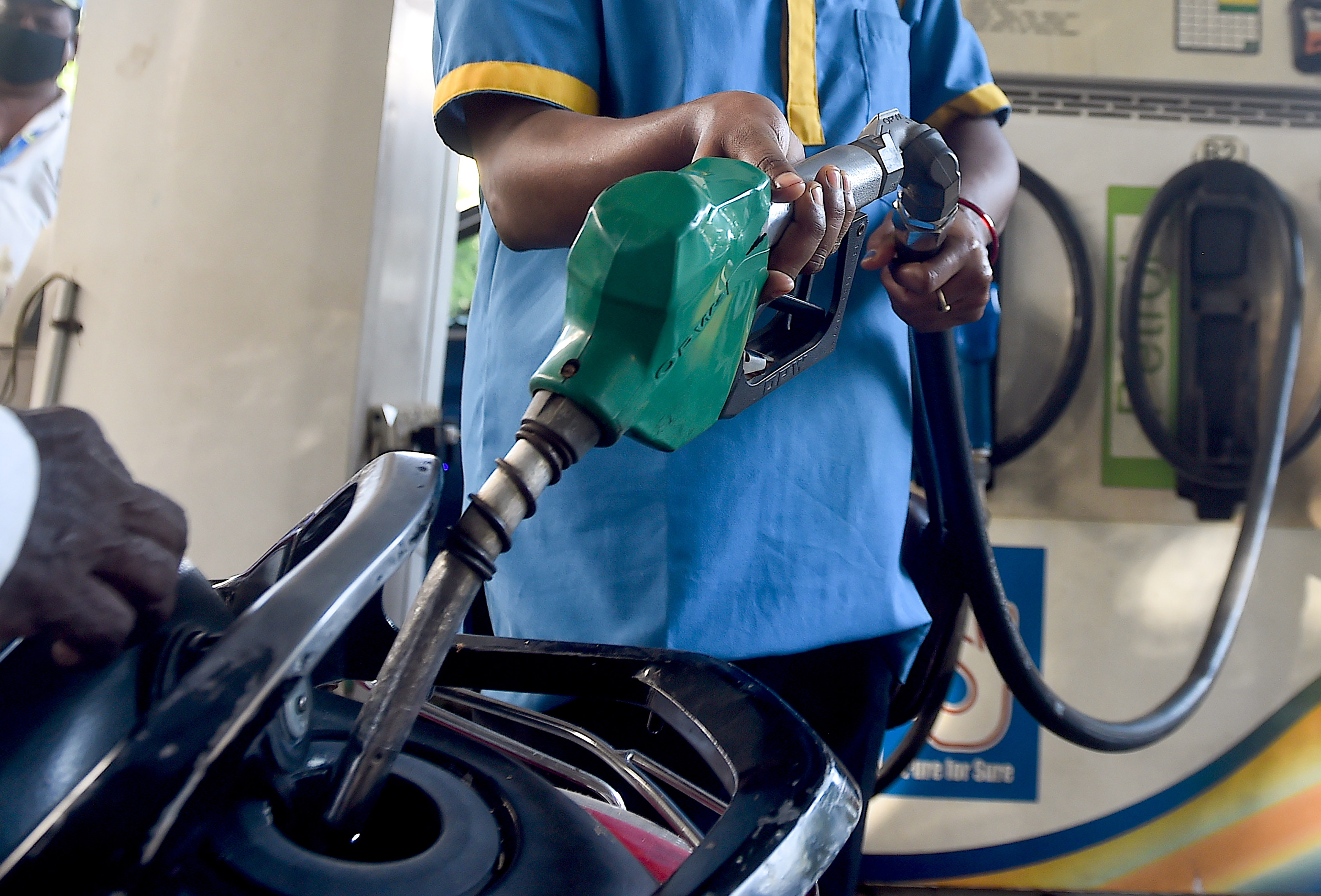 Chennai: An employee fills petrol in a scooter at a refilling station in Chennai Friday July 2 2021. Fuel prices in Chennai touched new highs Friday with petrol at Rs 100.13 per litre and diesel at Rs 93.74 per litre. 
