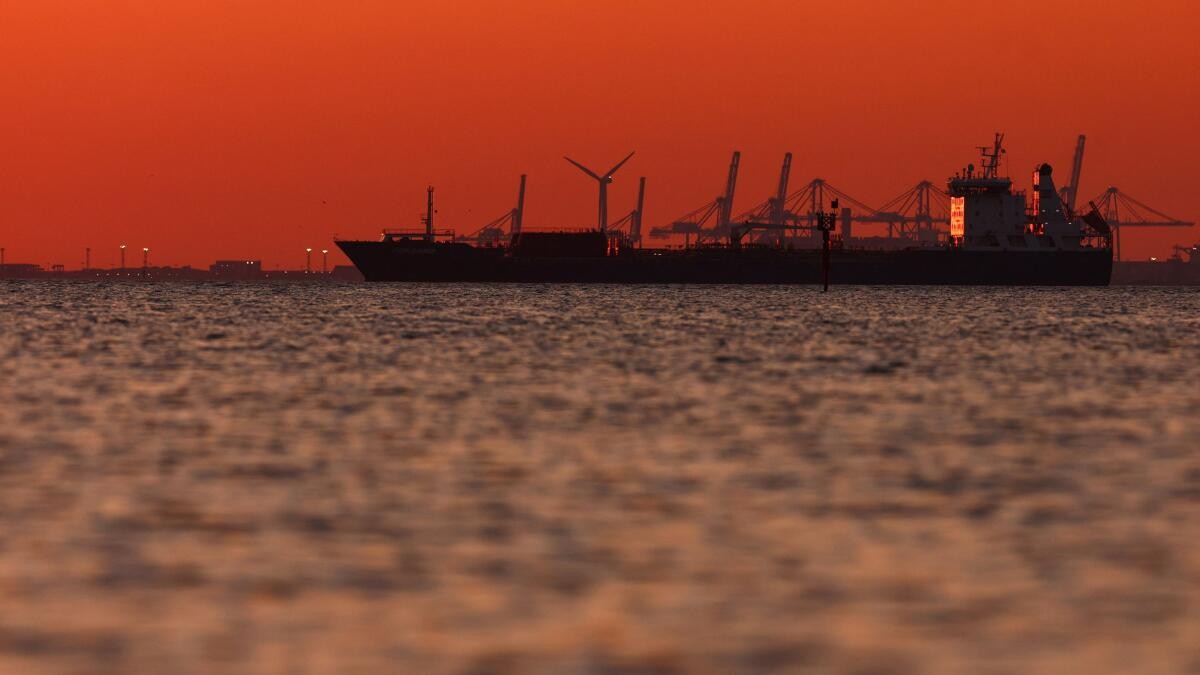 The silhouette of an oil and chemical tanker off the Gulf of Fos-sur-Mer at sunset, in Martigues, France, March 20, 2026.