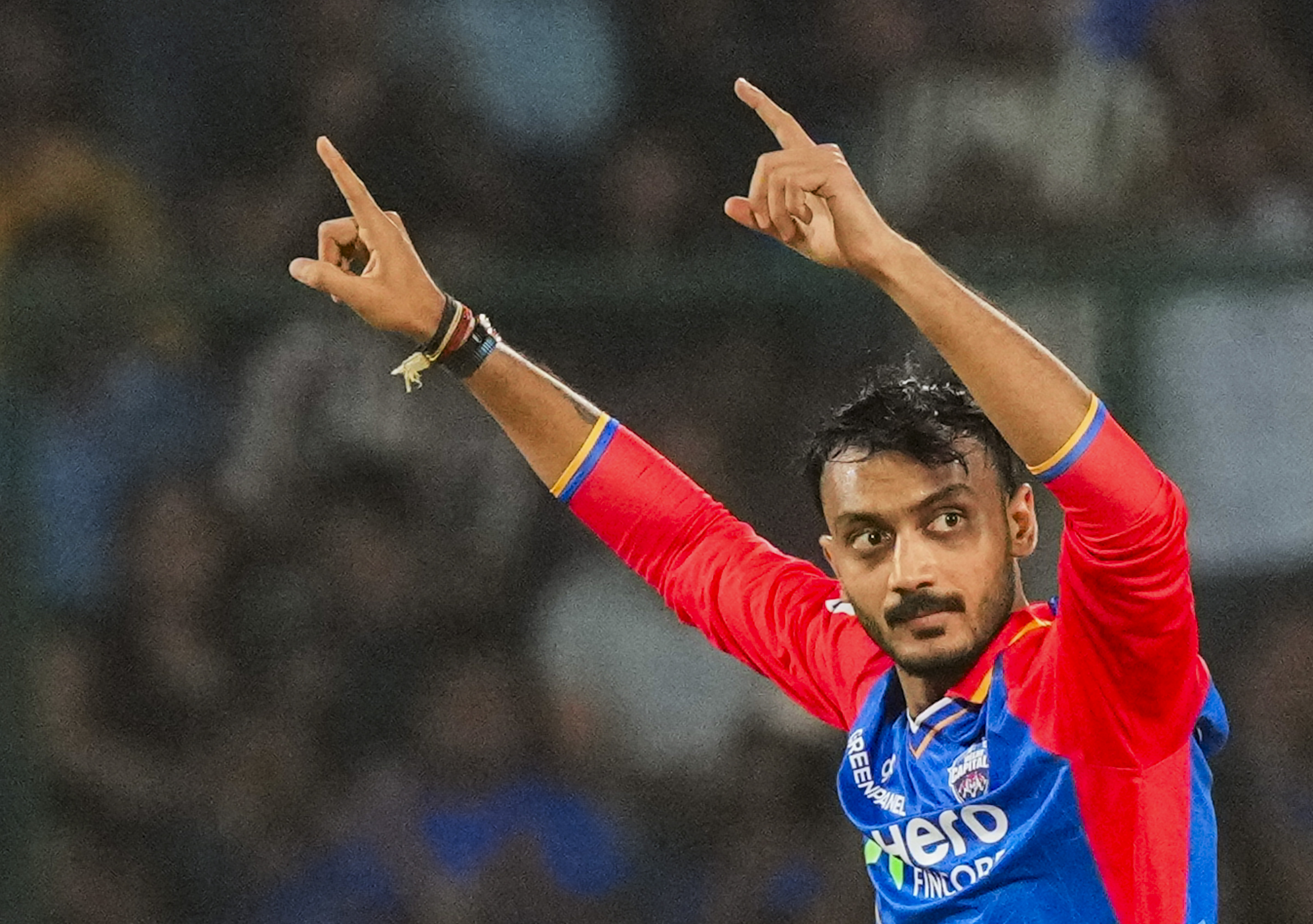 New Delhi: Delhi Capitals bowler Axar Patel celebrate wicket of Gujarat Titans batter A Omerzai during the Indian Premier League (IPL) 2024 cricket match between Delhi Capitals and Gujarat Titans at Arun Jaitley Stadium in New Delhi Wednesday April 24 2024. PTI